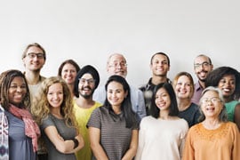 Group of diverse adults smiling for a team photo